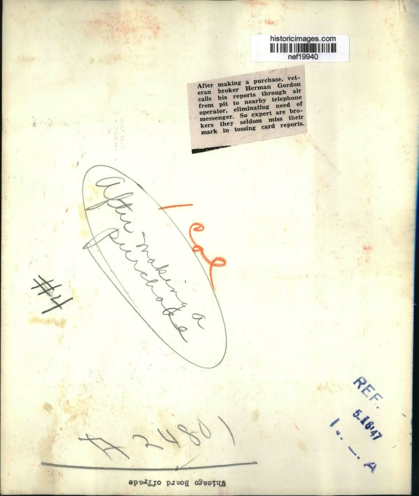 1947 Press Photo Broker Herman Gordon Throws Card Reports - nef19940