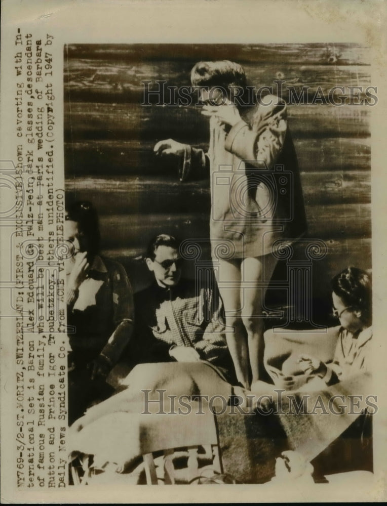 1947 Press Photo Baron Alex Edouard de Falz Fein Cavorting in St. Morittz