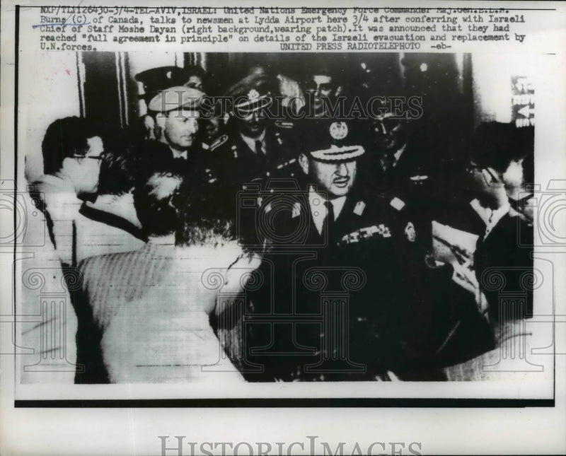 Load image into Gallery viewer, 1957 Press Photo E.L.M. Burns Interviewed at Lydda Airport, Tel Aviv, Israel
