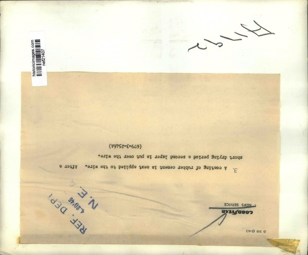 1946 Press Photo Coating of Rubber Cement Is Applied Over Wire - nef21407