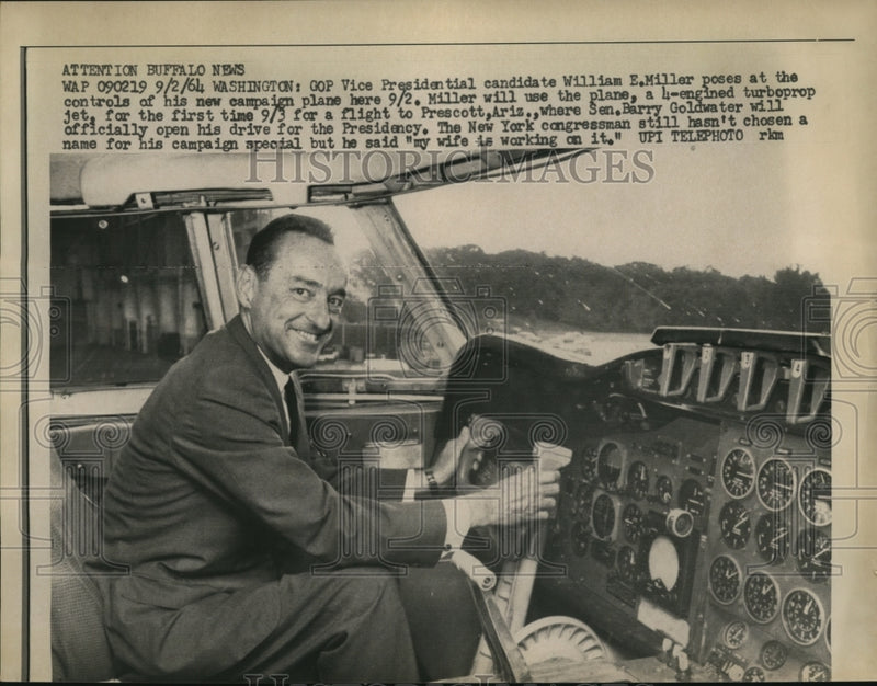 Load image into Gallery viewer, 1964 Press Photo William E.Miller posed at the control of his campaign Plane
