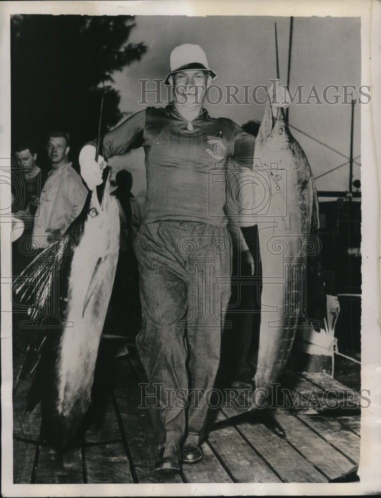 Load image into Gallery viewer, 1939 Press Photo Jim Thomas Holding 2-45 Pound Sailfish in Miami, Florida
