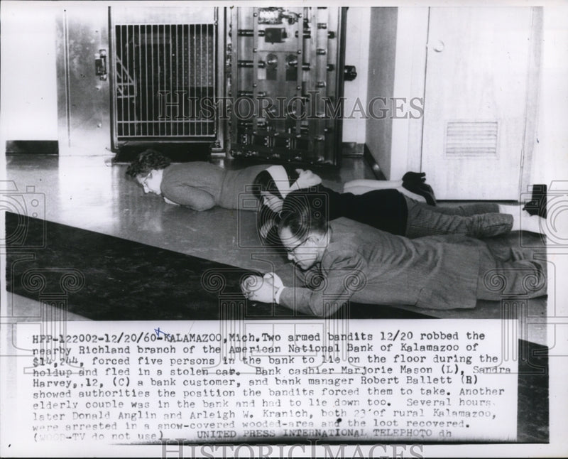 Load image into Gallery viewer, 1960 Press Photo Bank Employees on Floor During Robbery, Kalamazoo, Michigan
