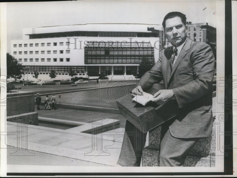 Load image into Gallery viewer, 1957 Press Photo James R. Hoffa During Lunch Recess of Senate Labor Rackets Comm
