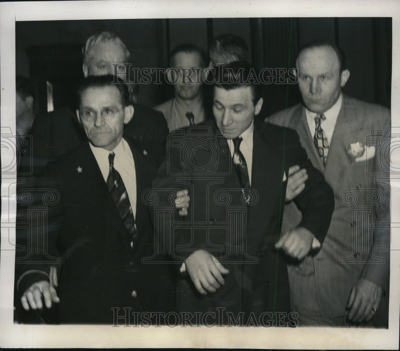 Load image into Gallery viewer, 1950 Press Photo Arthur Marino Leaving Court in Chicago - nef24893

