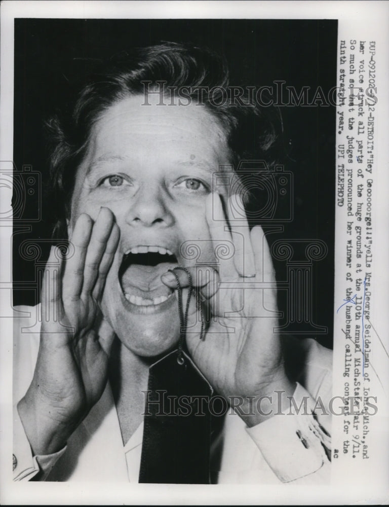 Load image into Gallery viewer, 1959 Press Photo Mrs. George Seidelman Wins Detroit Husband Calling Contest
