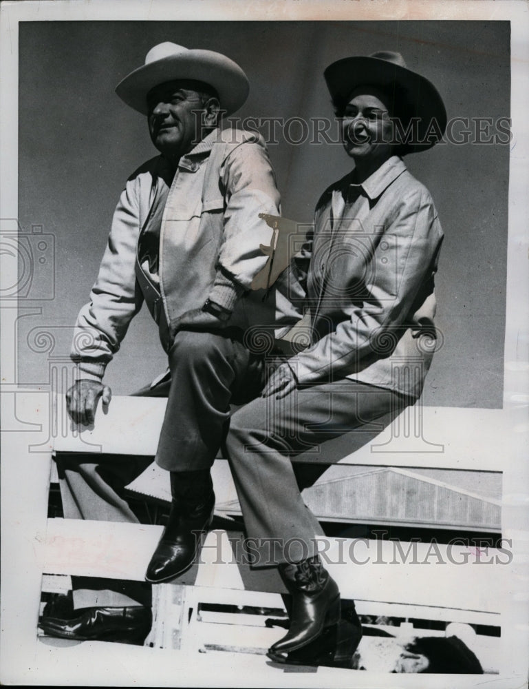 Load image into Gallery viewer, 1960 Press Photo Senator and Mrs. Johnson pose atop the corral fence at ranch
