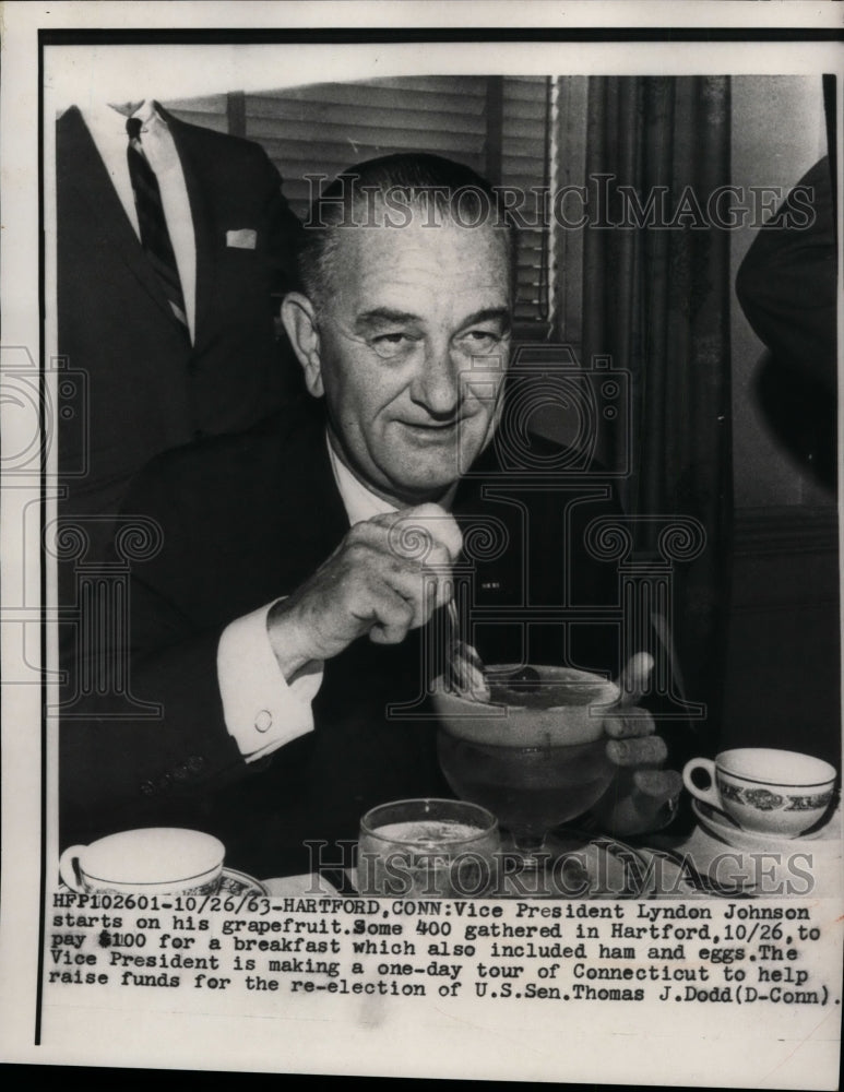 1963 Press Vice-Pres Johnson Starts on His Grapefruit During $100-Per-Breakfast