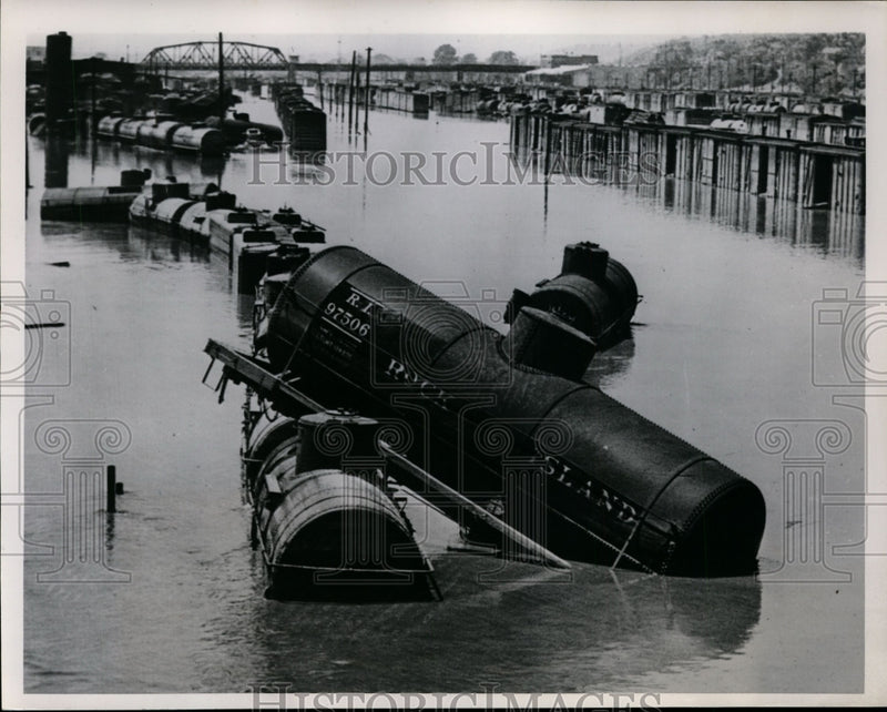 Load image into Gallery viewer, 1951 Press Photo Kansas City, Kansas Oil Tank Lifted off Track in Flooding
