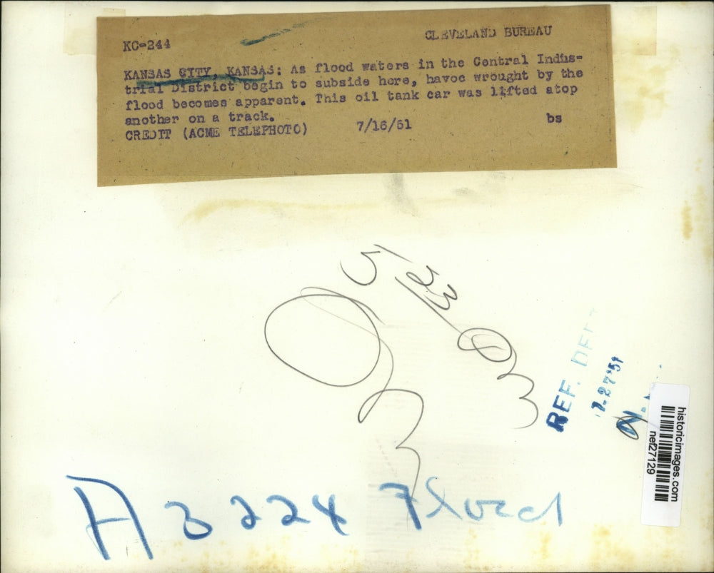 1951 Press Photo Kansas City, Kansas Oil Tank Lifted off Track in Flooding