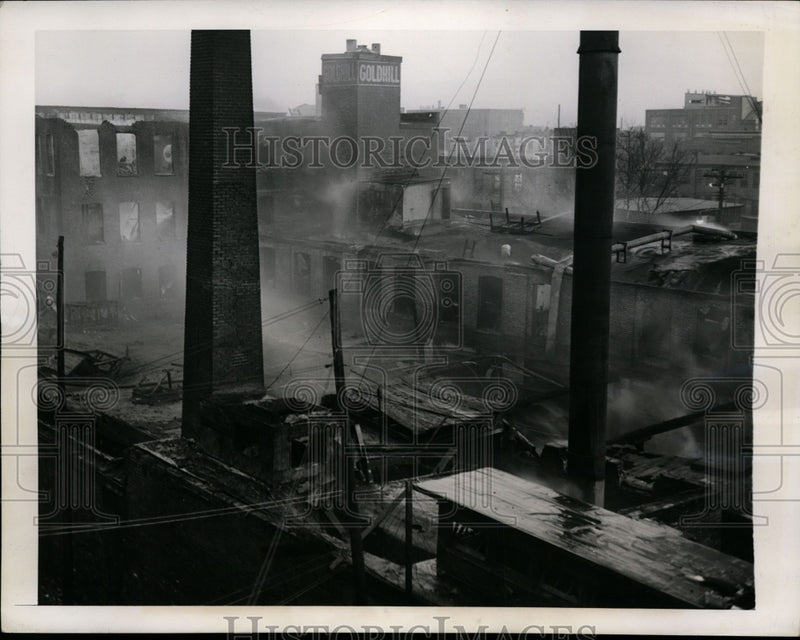 Load image into Gallery viewer, 1945 Press Photo Cat causes a 4-alarm fire on a barrel of naptha - nef27163

