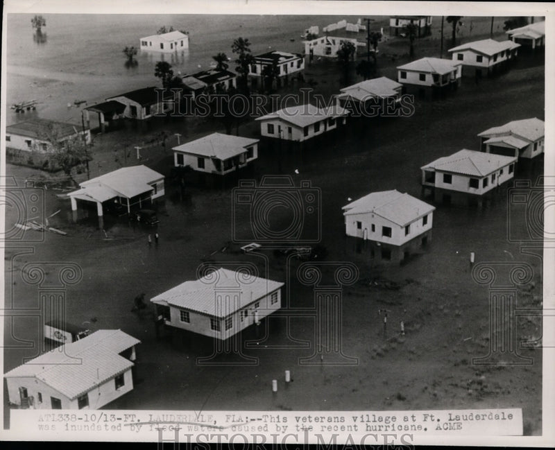 Load image into Gallery viewer, 1947 Press Photo Veterans village at Ft. Lauderdale invaded by flood waters
