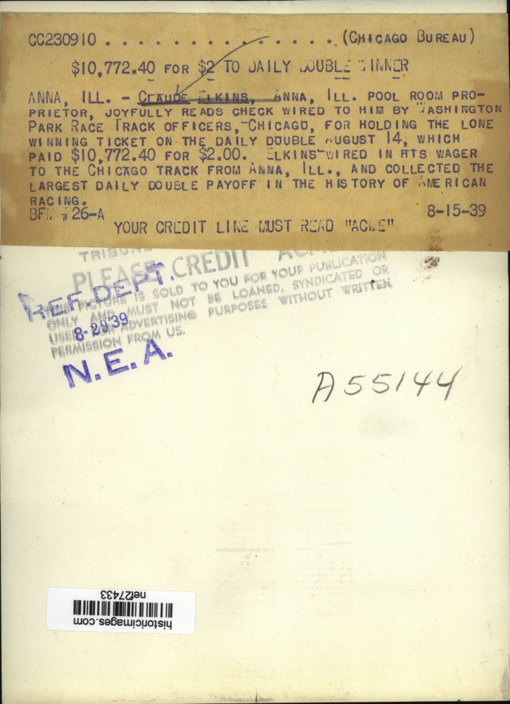 1939 Press Photo Claude Elkins hold the Lone winning ticket on the Daily Double