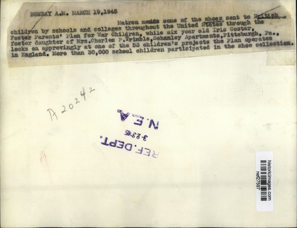 1945 Press Photo Mending Shoes Sent to British Children from US Schools & Colleg