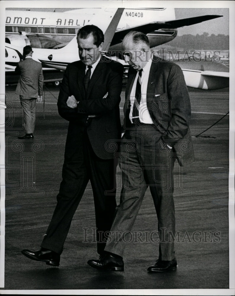 Load image into Gallery viewer, 1968 Press Photo Nixon Walks to His Plane With Campaign Manager John Mitchell
