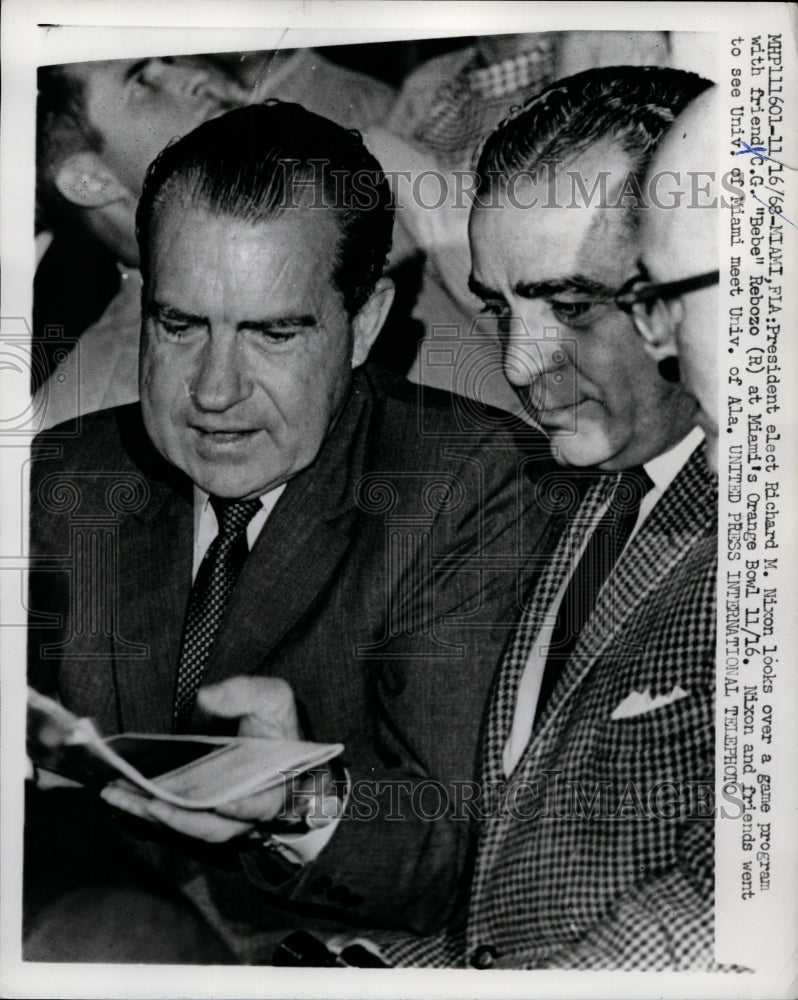Load image into Gallery viewer, 1968 Press Photo Richard Nixon, C.G. "Bebe" Rebonzo at Orange Bowl, Miami
