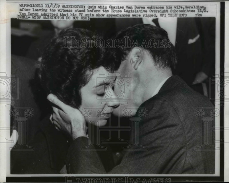 Load image into Gallery viewer, 1959 Press Photo Charles Van Doren Embraces Wife After Leaving Witness Stand
