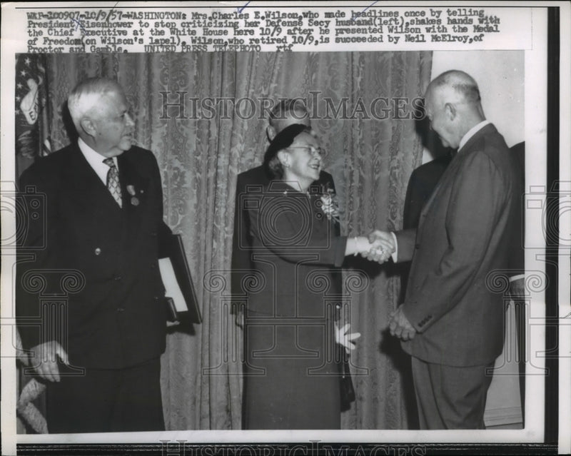 Load image into Gallery viewer, 1957 Press Photo Mrs Charles E Wilson Shakes Hands With the Chief Executive
