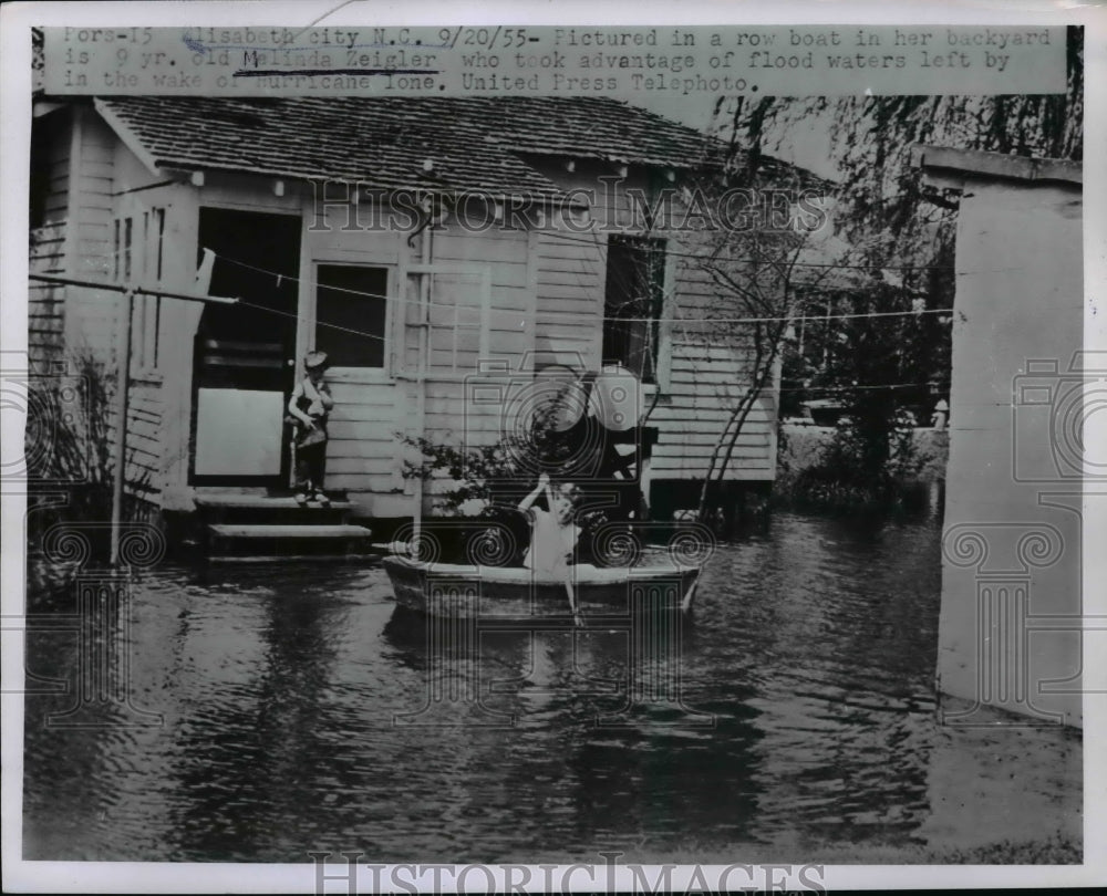 1955 Press Photo 9 YO Melinda Zeigler Takes Advantage of Hurricane Lone's Floods