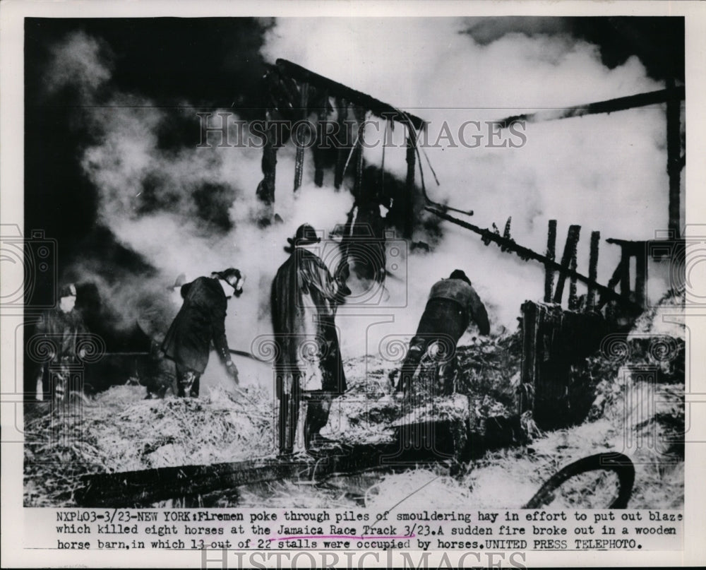 1923 Press Photo NY: Firemen Trudge Through Smoldering Jamaica Race Track Hay