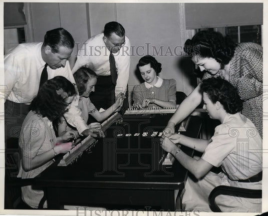 1941 Press Photo Selective Service Workers Eerily Happy to be Doing Job