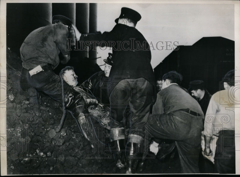 Load image into Gallery viewer, 1950 Press Photo Michael Giannone As He Was Removed From Bottom of 80-Foot Silo

