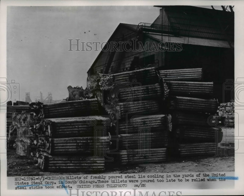 Load image into Gallery viewer, 1952 Press Photo Billets lie cooling in the yards of U.S. Steel Corp in Chicago

