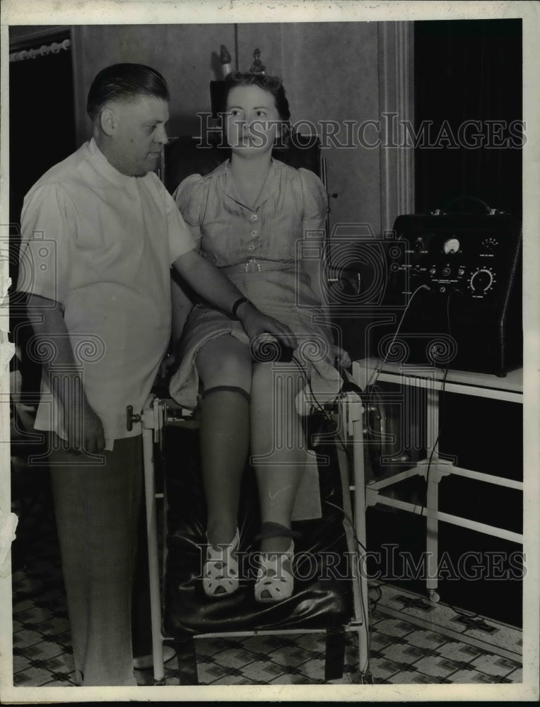 Load image into Gallery viewer, 1938 Press Photo Dr. Charles Wood Demonstrating Paralysis Treatment Machine
