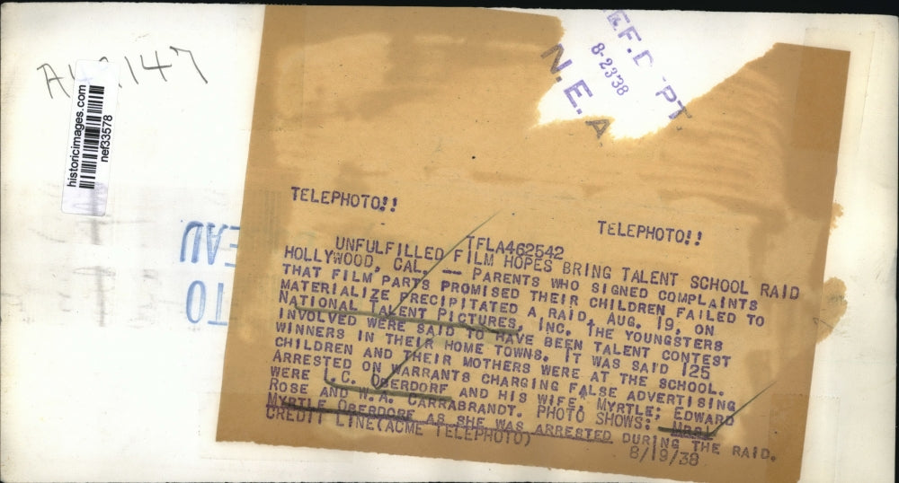 1938 Press Photo Woman Arrested at National Talent Pictures Inc. Raid, Hollywood