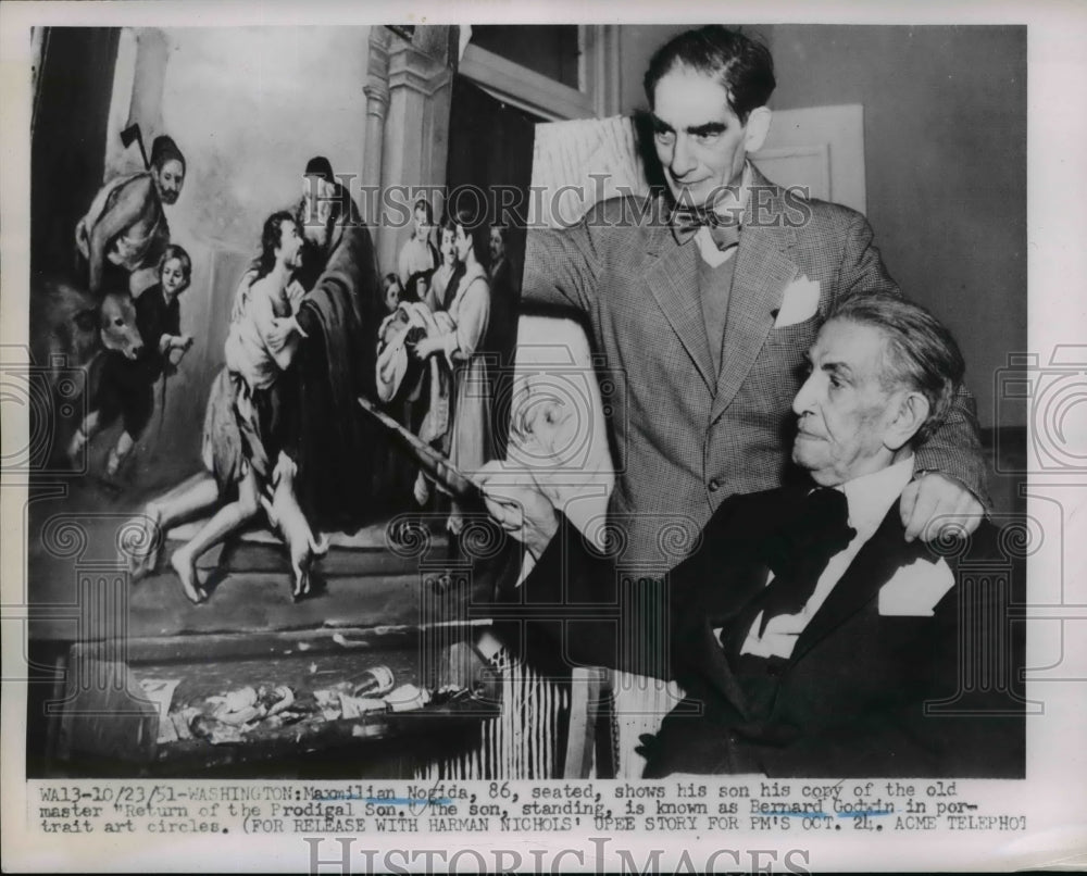 1951 Press Photo Maxmilian Nogida with Copy of Return of The Prodigal Son