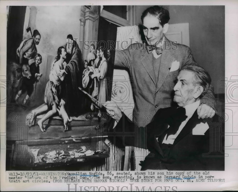 Load image into Gallery viewer, 1951 Press Photo Maxmilian Nogida with Copy of Return of The Prodigal Son
