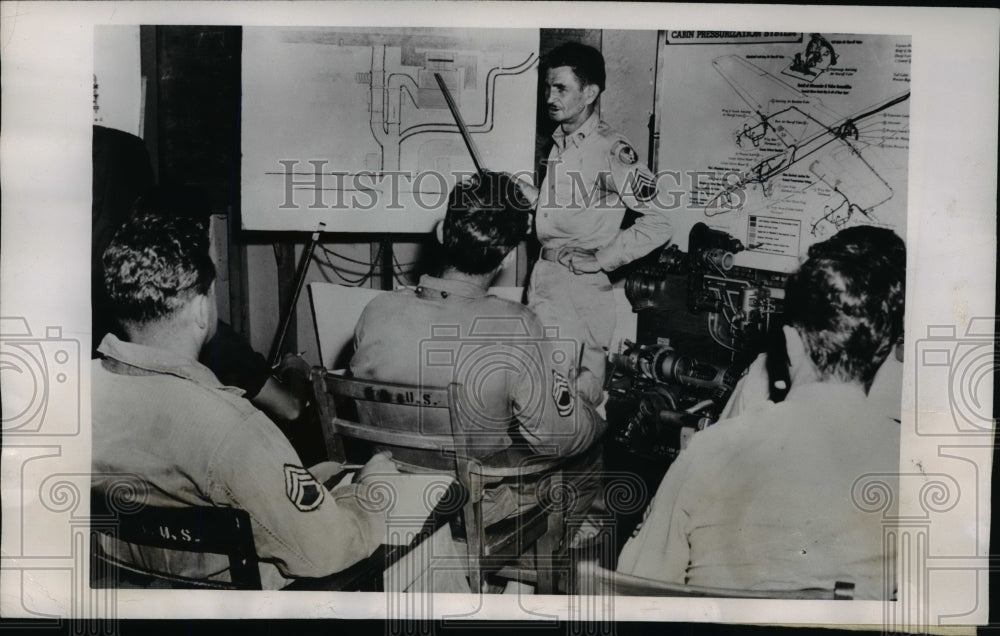1949 Press Photo Instructor Uses Charts to Visually Illustrate B-45 Cabin System