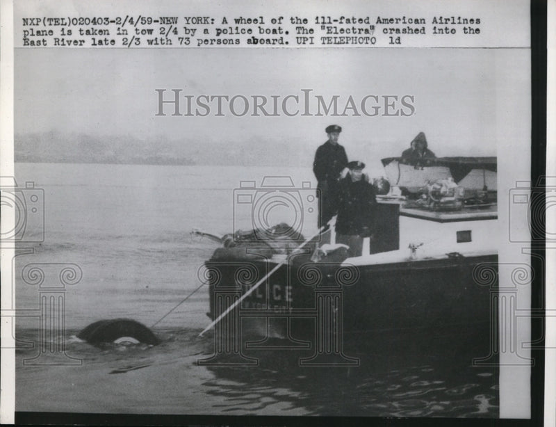 Load image into Gallery viewer, 1959 Press Photo "Electra" American Airlines Plane Towed out of East River, NY
