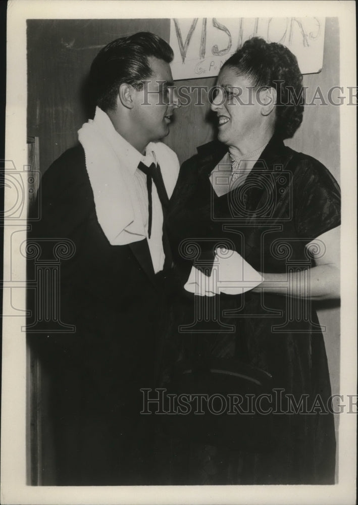 Load image into Gallery viewer, 1953 Press Photo Johnny Desmon Chats Backstage at Ciro's with Carmelita Columbo
