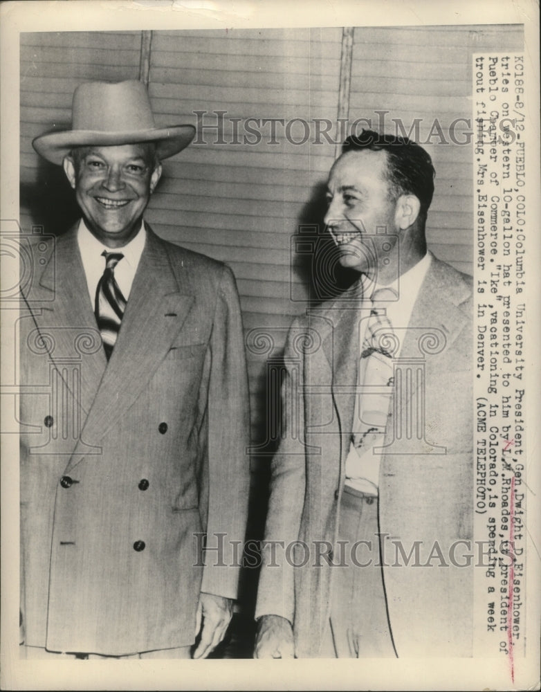 1948 Press Photo Pres Eisehower Tries on Hat Presented to Him by L.M. Rhoades