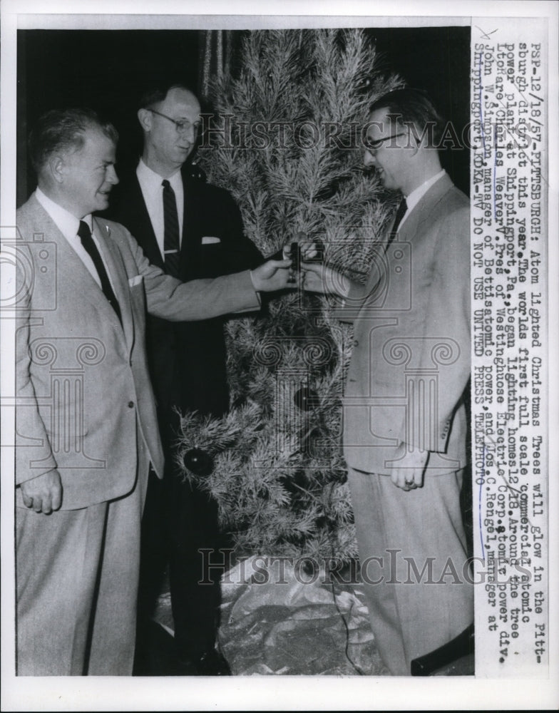 1957 Press Photo Atom Lighted Christmas Tree Will glow in Pittsburgh District