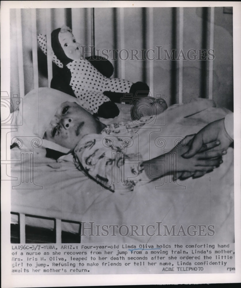 1951 Press Photo Linda Oliva Holds Nurses' Hand as She Recovers From Her Jump