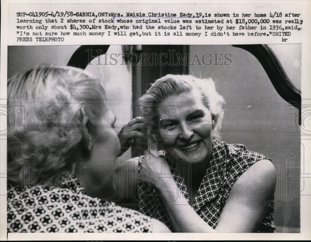 1958 Press Photo Mrs. Eady in her home after learning her stock shares were less