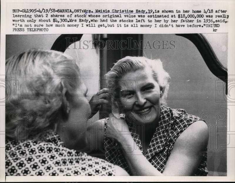 Load image into Gallery viewer, 1958 Press Photo Mrs. Eady in her home after learning her stock shares were less
