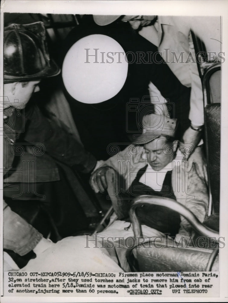 1959 Press Photo Firemen Put Dominic Paris on Stretcher After Remove From Cab