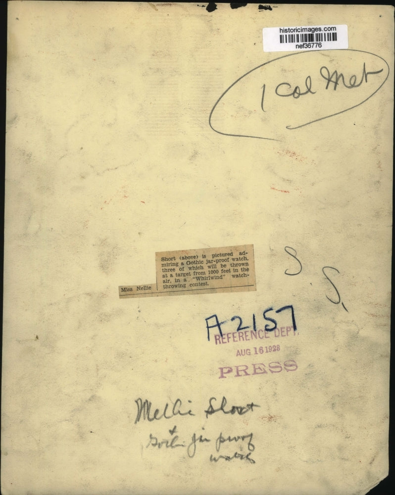 1928 Press Photo Ms.Nelle Short pictured with admiring a Gothic Jar-Proof Watch