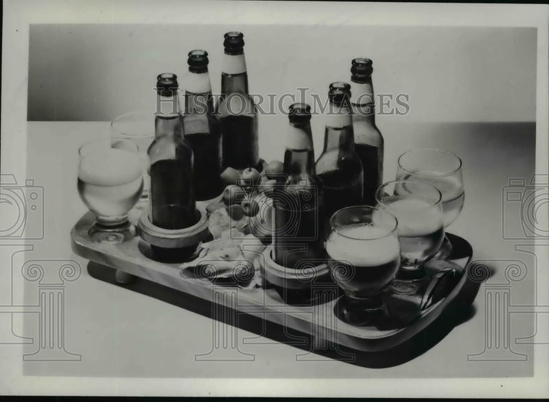 Load image into Gallery viewer, 1953 Press Photo Beer Bottles on Serving Tray - nef37756
