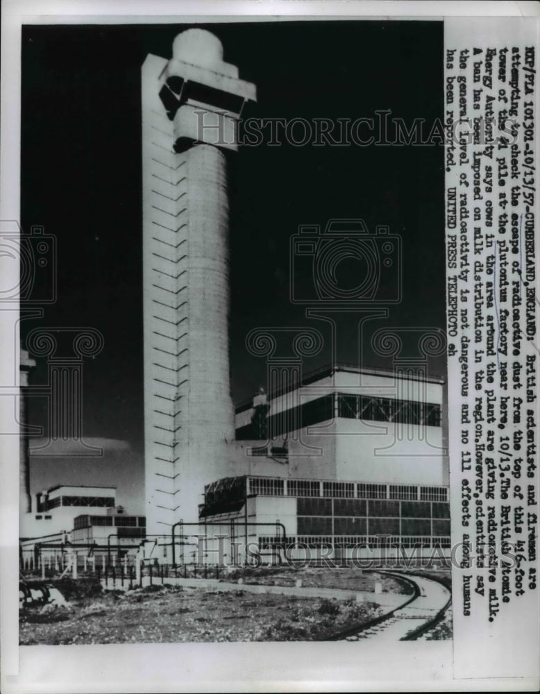 1957 Press Photo Scientists and firemen check the escape of radioactive dust
