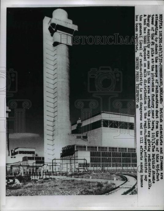 1957 Press Photo Scientists and firemen check the escape of radioactive dust