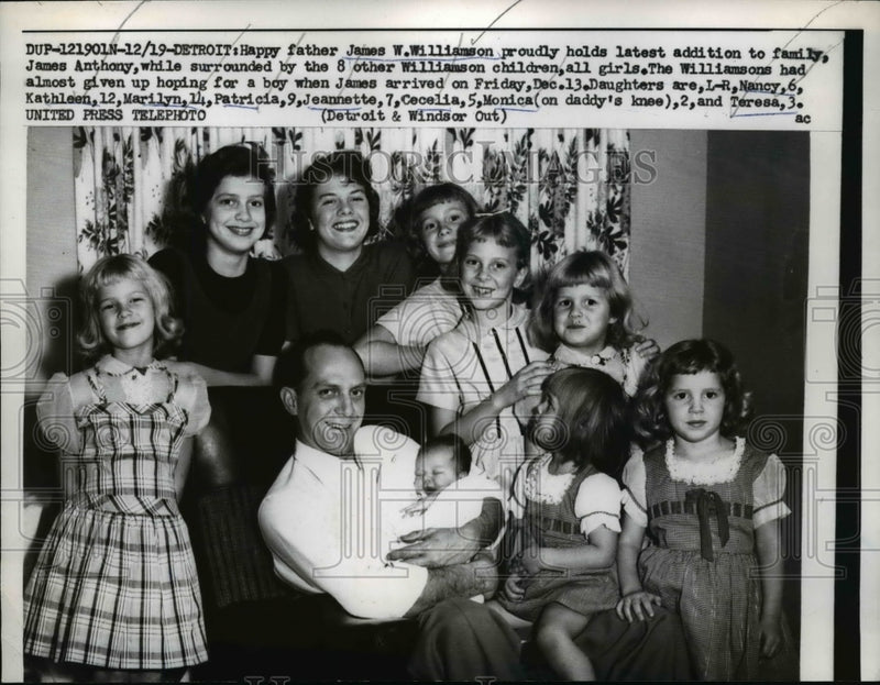 Load image into Gallery viewer, 1958 Press Photo Detroit James W. Williamson Holds Newborn James Anthony
