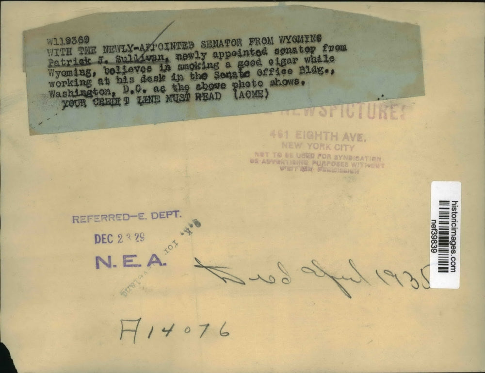 1929 Press Photo Patrick J. Sullivan smokes a cigar at his desk - nef39839