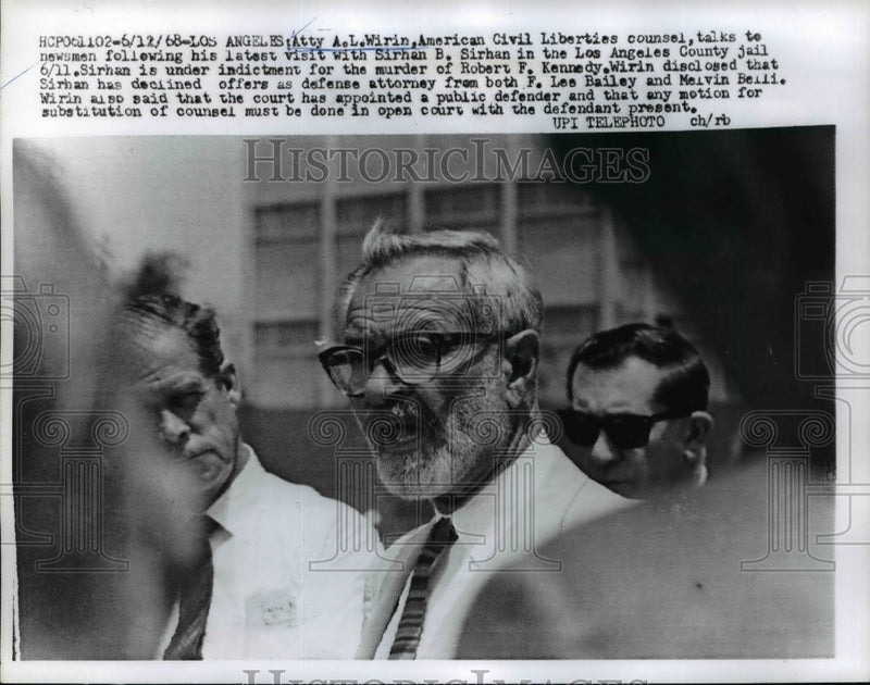 Load image into Gallery viewer, 1968 Press Photo Wirin talks to newsmen after his visit with Sirhan in jail
