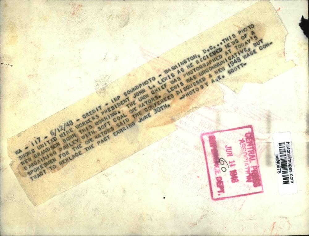 1948 Press Photo John L. Lewis receives news that a new grandson was born