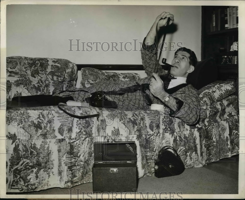 1942 Press Photo Robert R. Nathan Examining Roll of Film - nef41329