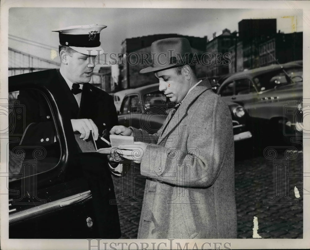 1949 Press Photo Mr Arnett's Car Runs Into Water Pulled Out Gets Parking Ticket